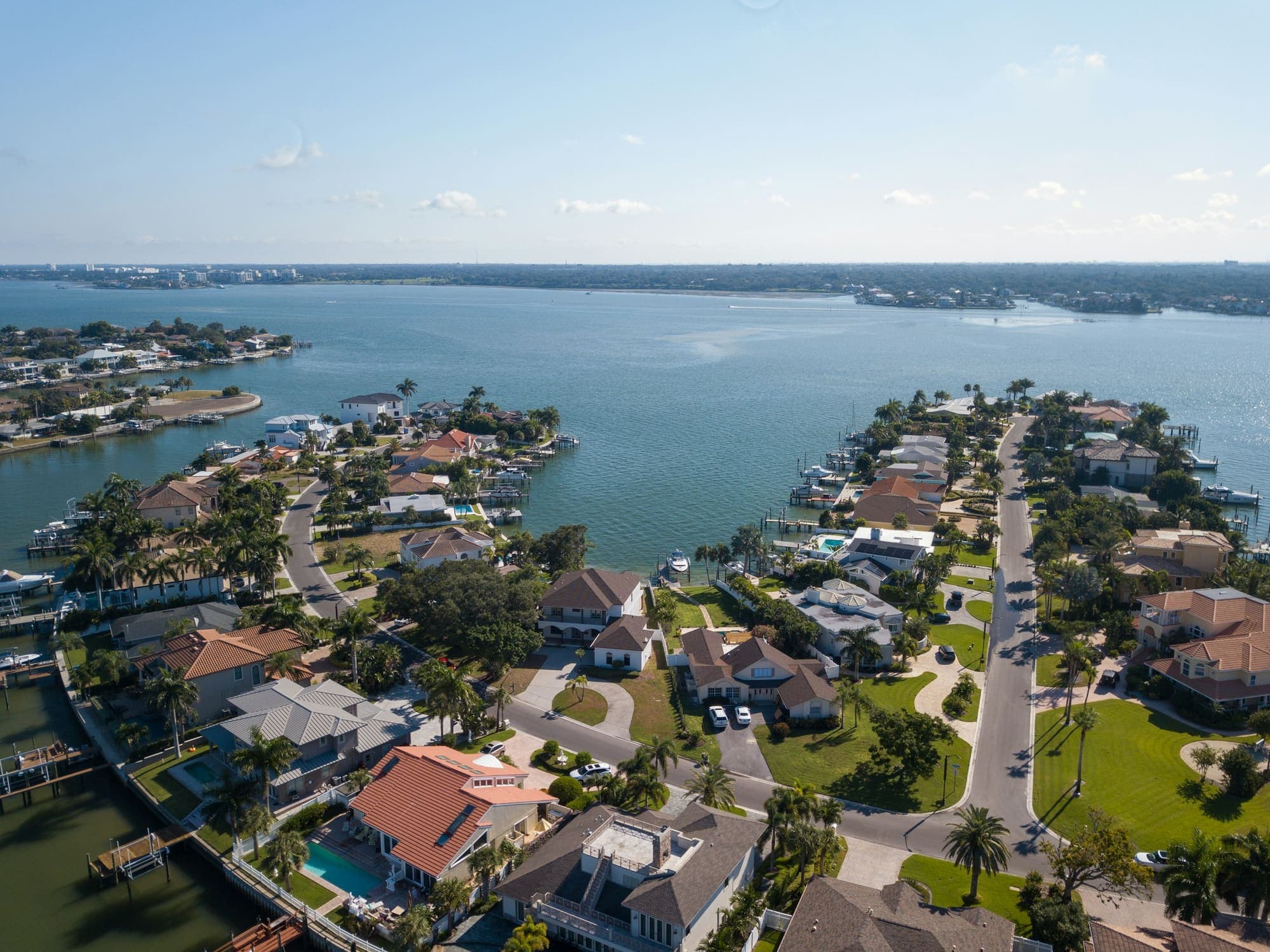 Aerial view of a waterfront neighborhood with canals and docks